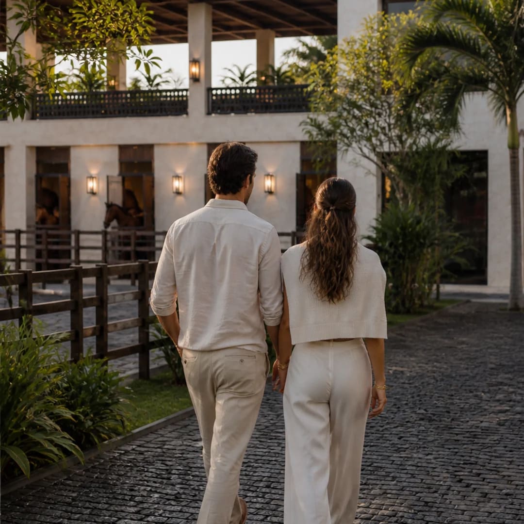 Conceptual view of a couple arriving at the club through a landscaped courtyard.